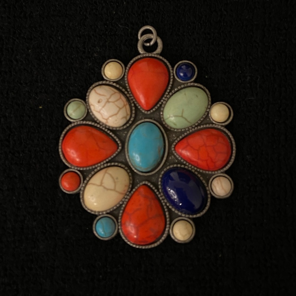Faux metal and stone charm in flower shape